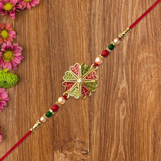 Traditional Kundan Rakhi With Golden Floral Base And Rudraksha Beads Wukusy