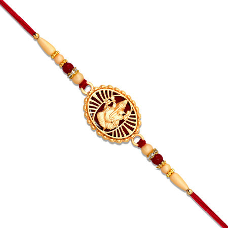 Traditional Ganesha Rakhi With Golden Finish And Sacred Red Thread Wukusy