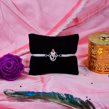 Stylish Ganesha Rakhi With Enamel Highlights And Silver Metal Chain Wukusy