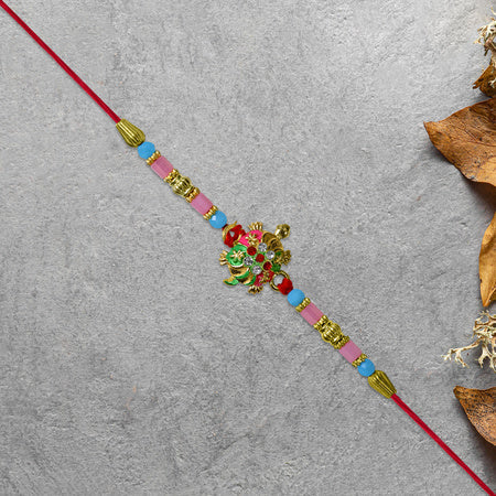 Turtle Design Rakhi With Floral Accents And Beads Wukusy