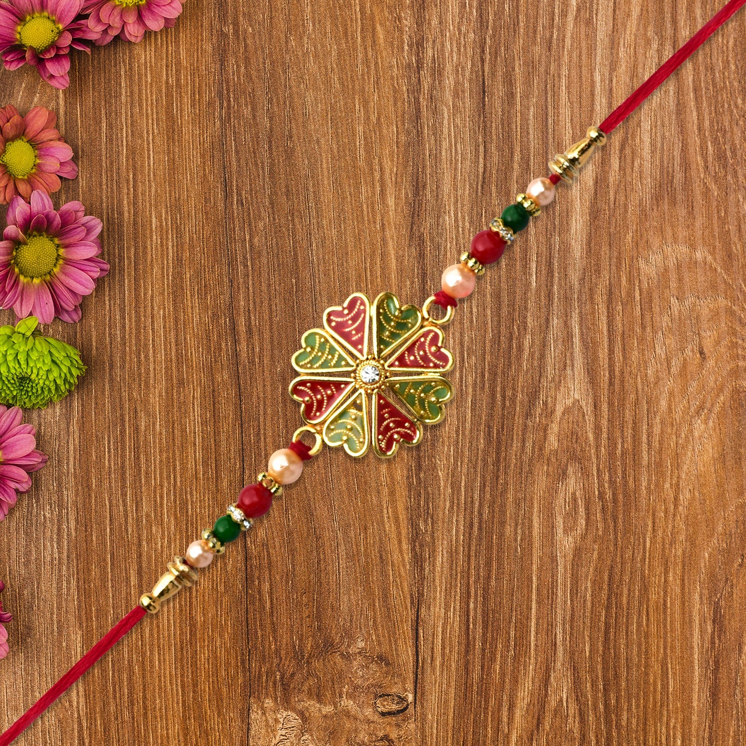 Traditional Rakhi With Bright Floral Centerpiece And Decorative Thread Wukusy