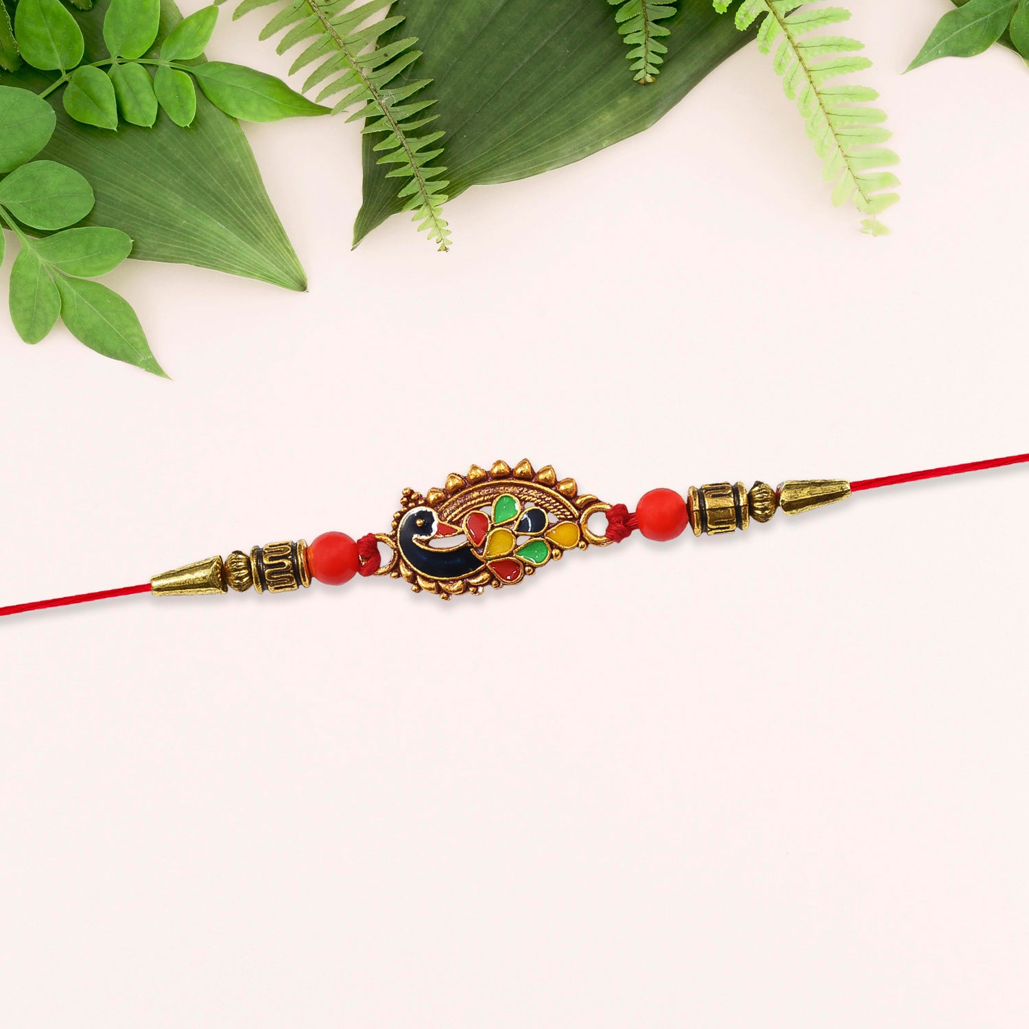 Stylish Rakhi With Gold-toned Leaf Dial Wukusy