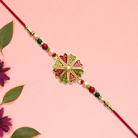 Traditional Rakhi With Bright Floral Centerpiece And Decorative Thread Wukusy