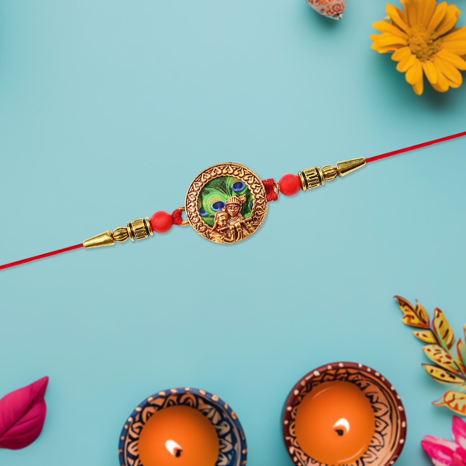 Traditional Krishna Rakhi With Peacock Feather Design And Decorative Beads On Red Thread Wukusy