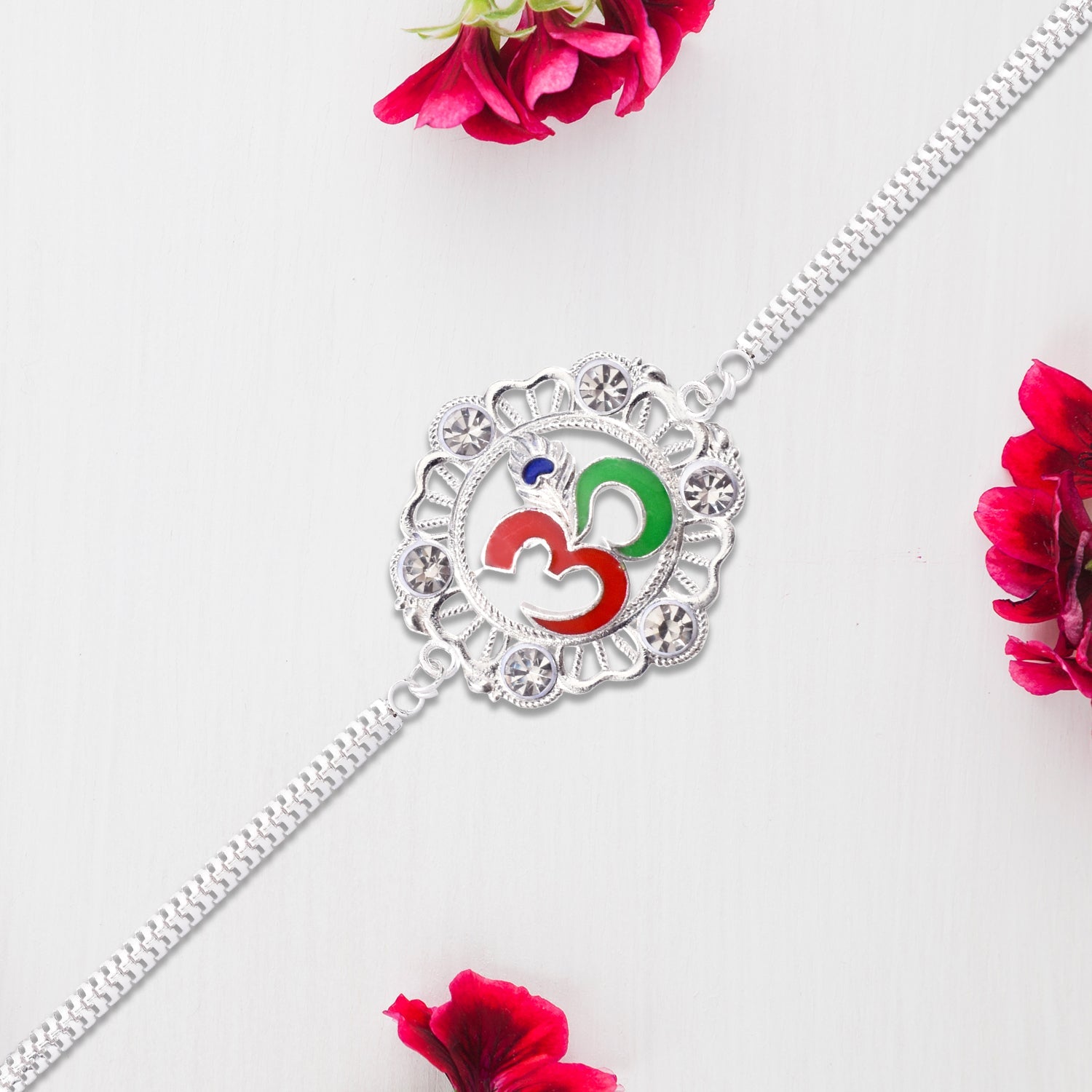 Silver Om Rakhi With Stone Embellishments Wukusy