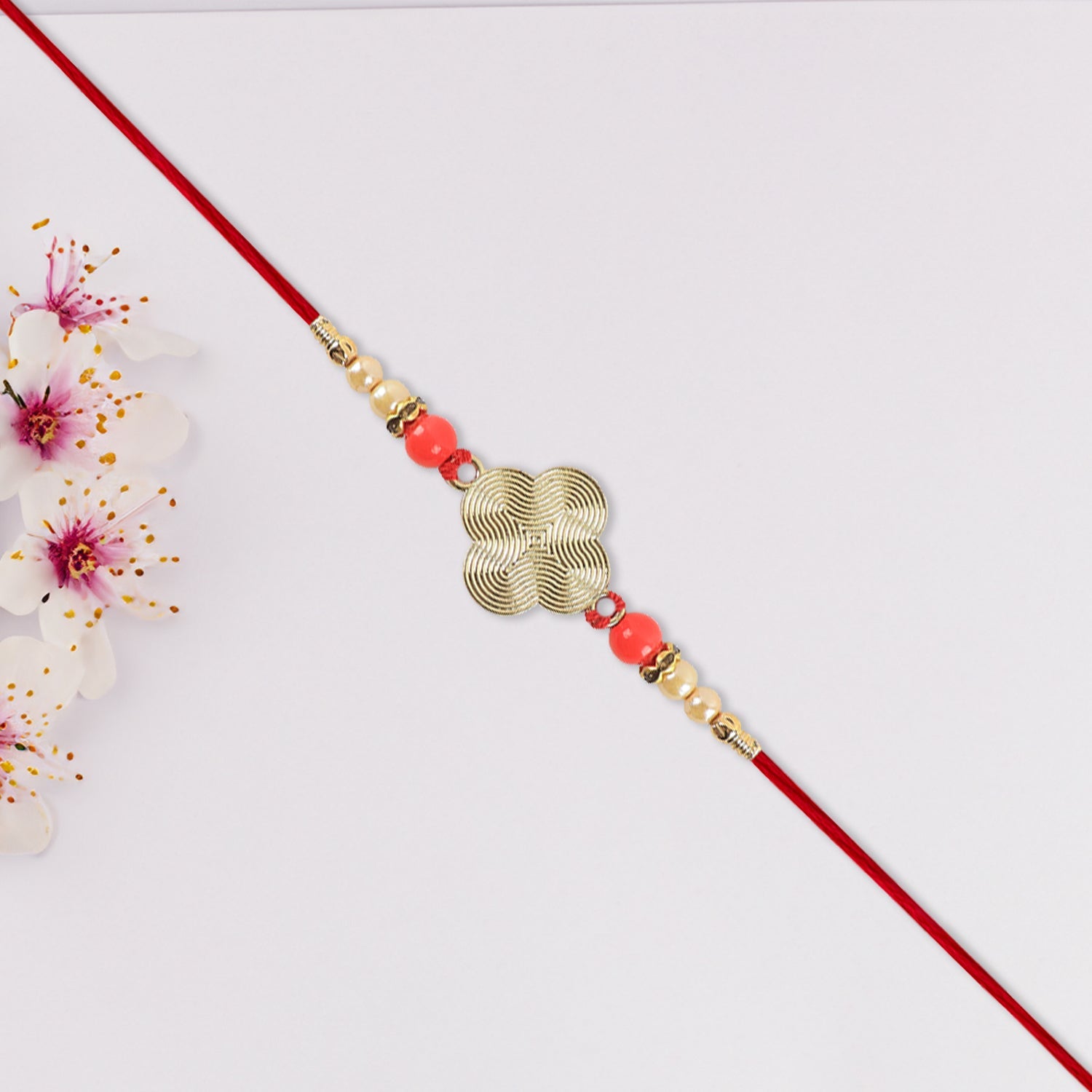 Rakhi With Multicolor Beads  Silver Accents On Red Thread Wukusy