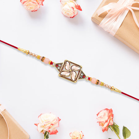Designer Rakhi With Swastik-inspired Kundan Dial And Decorative Beads Wukusy