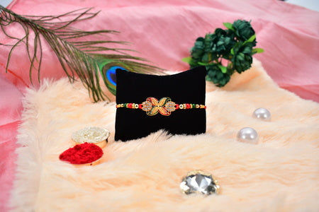 Elegant Red-green Bead Rakhi With Intricate Golden Flower Motif Wukusy