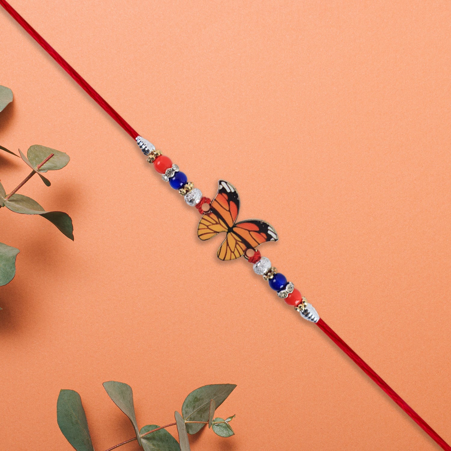 Vibrant Butterfly Rakhi With Colorful Beads  Red Mauli Thread Wukusy