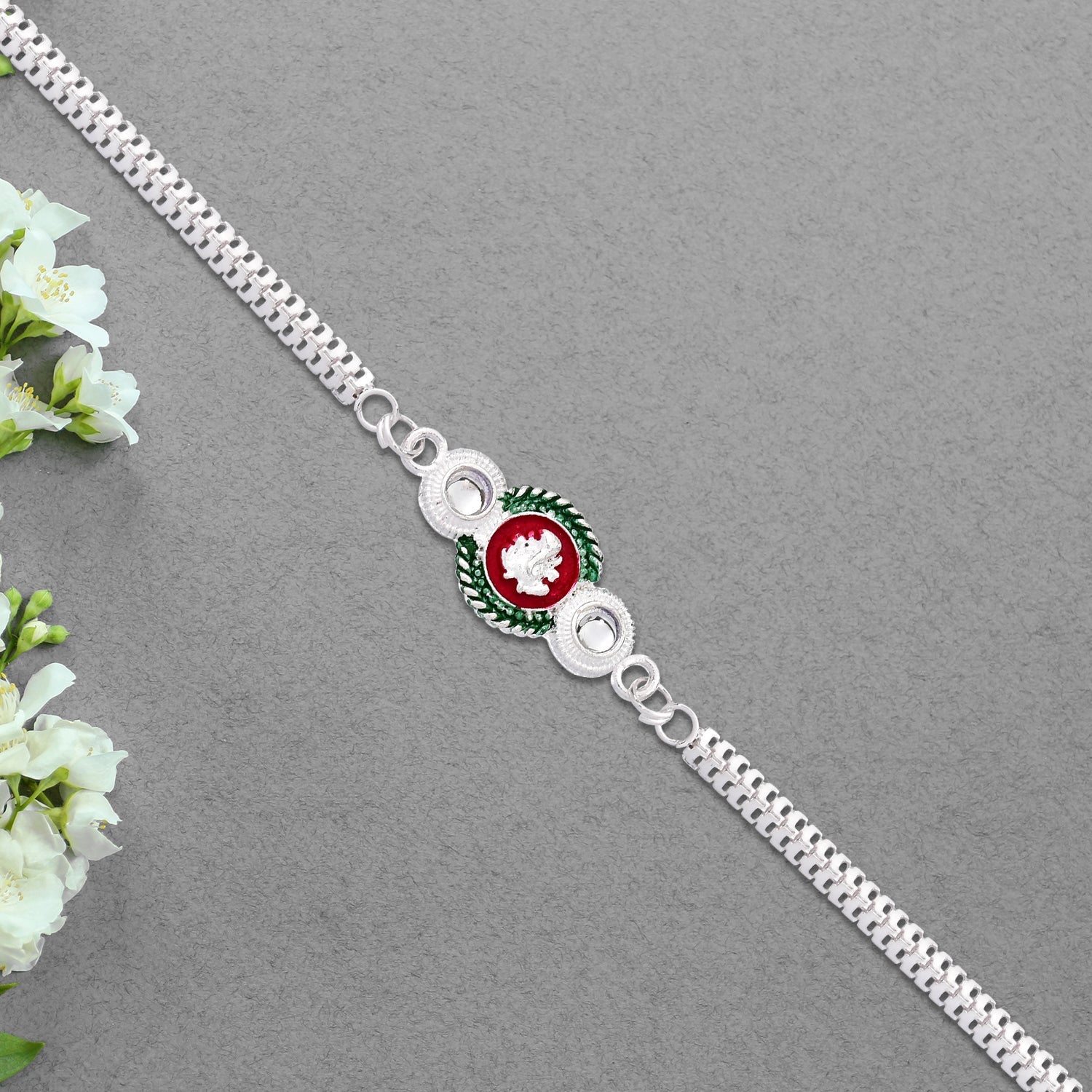 Shiny Silver Rakhi With Ganesha Emblem And Elegant Dual Chain Design Wukusy