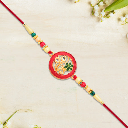 Round Designer Paisley Rakhi With Floral Charm Wukusy