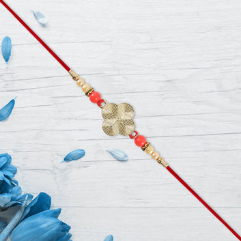 Rakhi With Multicolor Beads  Silver Accents On Red Thread