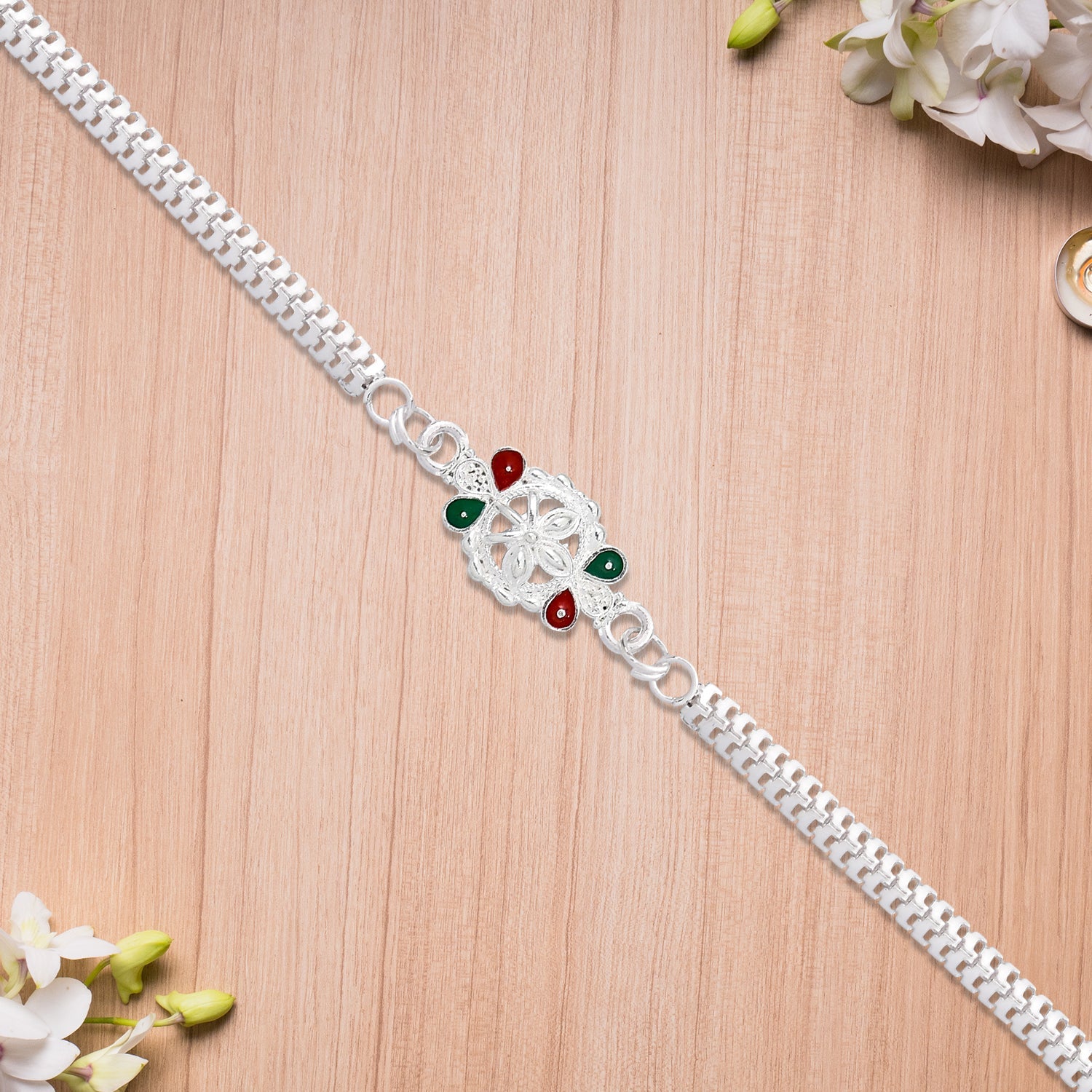 Delicate Metal Chain Rakhi With Enamel Floral Center Wukusy