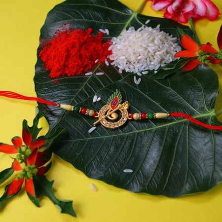 Krishna Flute Rakhi With Stone Studded Peacock Feather Design Wukusy