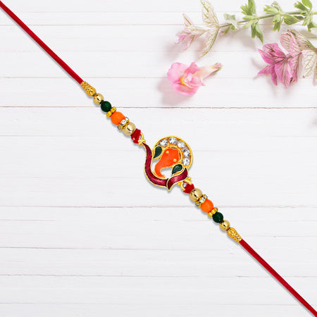 Golden Ganesha Rakhi With Red-green Beads And Stone Detailing Wukusy