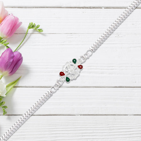 Delicate Metal Chain Rakhi With Enamel Floral Center Wukusy