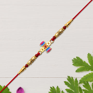 Damru Rakhi With Beads And Floral Detailing Wukusy