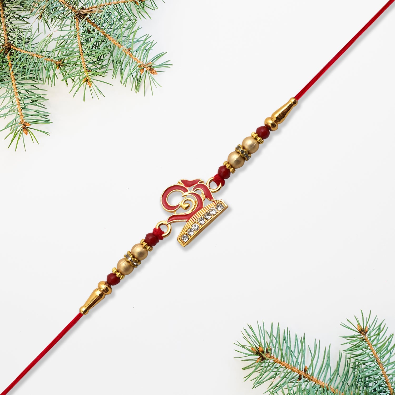 Om Design Traditional Rakhi Wukusy