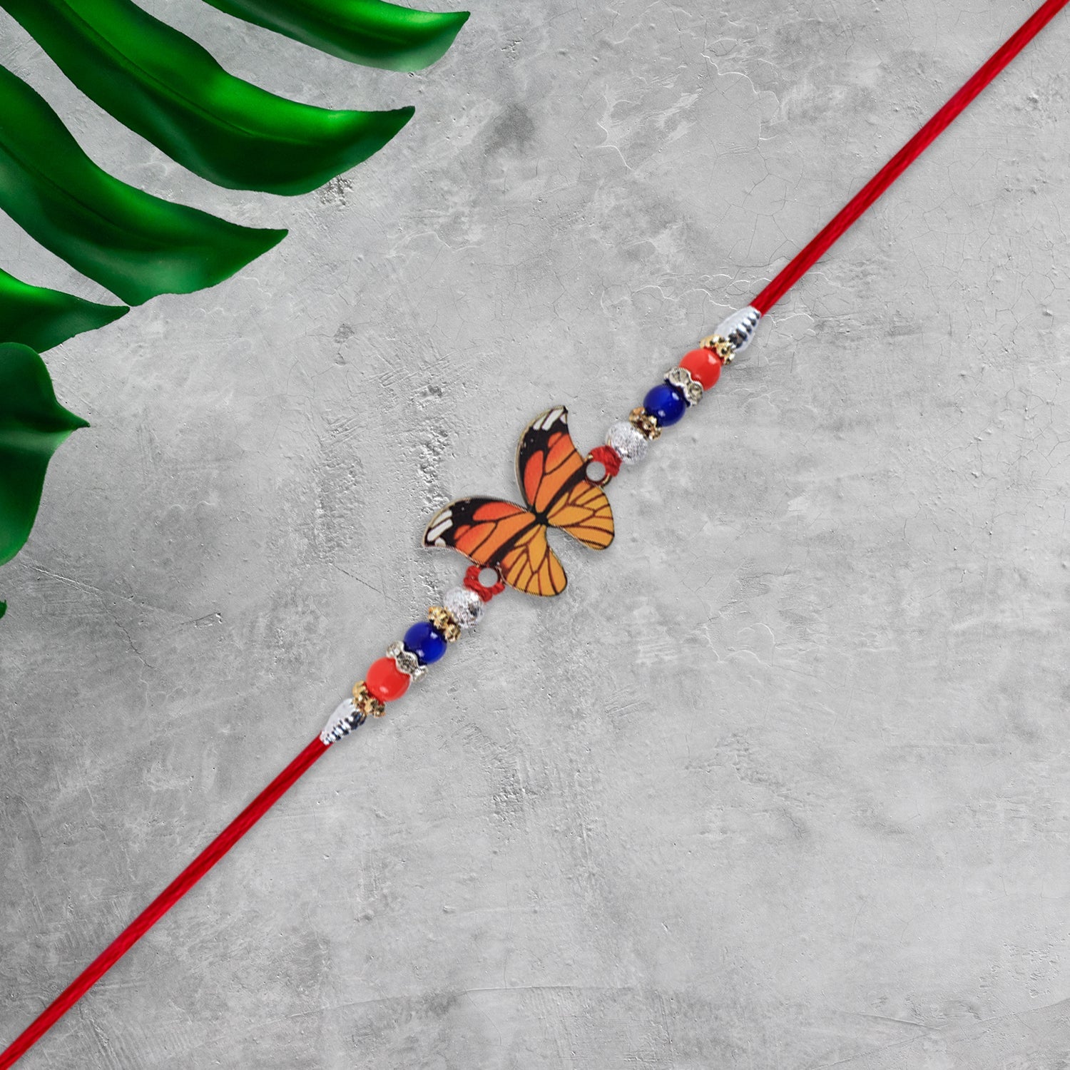 Vibrant Butterfly Rakhi With Colorful Beads  Red Mauli Thread Wukusy