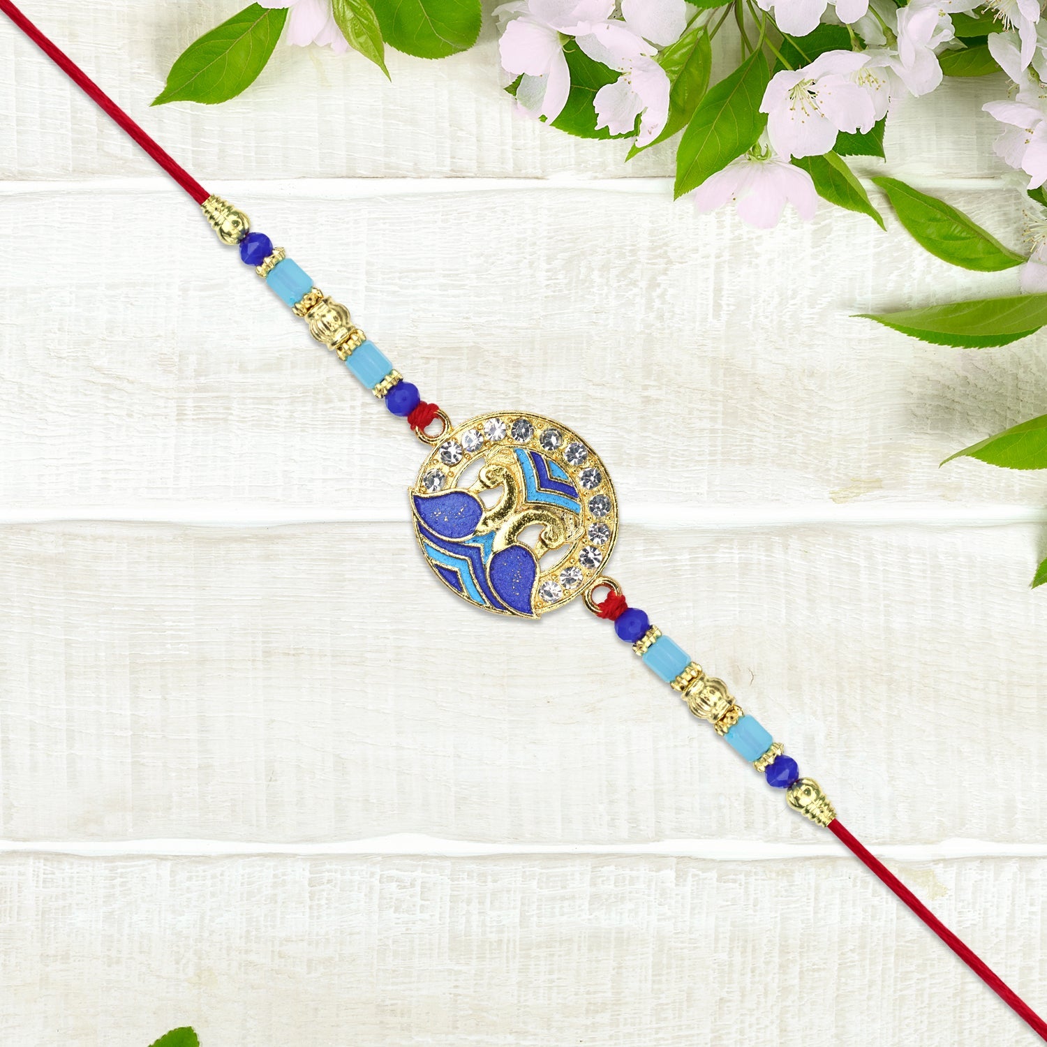Blue Peacock Feather Rakhi Wukusy