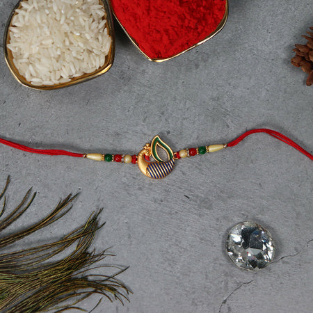 Beautiful Peacock Feather Rakhi Wukusy