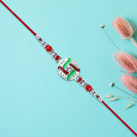 Silver-tone Swastik Rakhi Wukusy