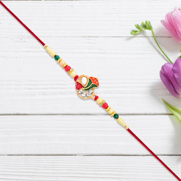 Divine Ganpati Rakhi With Enamel Work And Traditional Beads