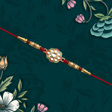 Kundan Work Floral Rakhi With Red Thread Wukusy
