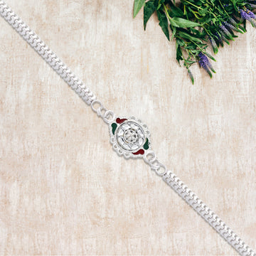 Stylish Rakhi With Intricate Floral Motif And Enamel Touches Wukusy