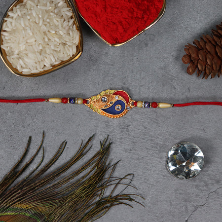 Elegant Rakhi With Enamel Paisley Design And Gold-tone Embellishments Wukusy