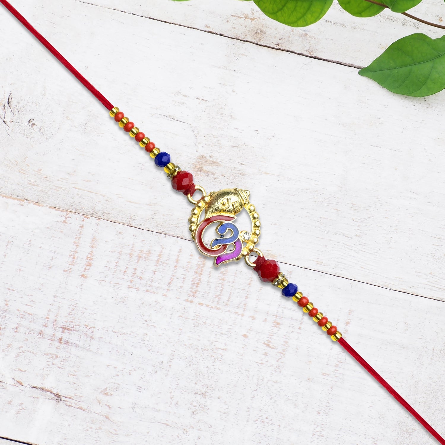 Ganesh Rakhi With Vibrant Enamel Work Wukusy