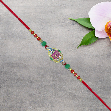 Om Rakhi With Decorative Beads And Stone Work Wukusy