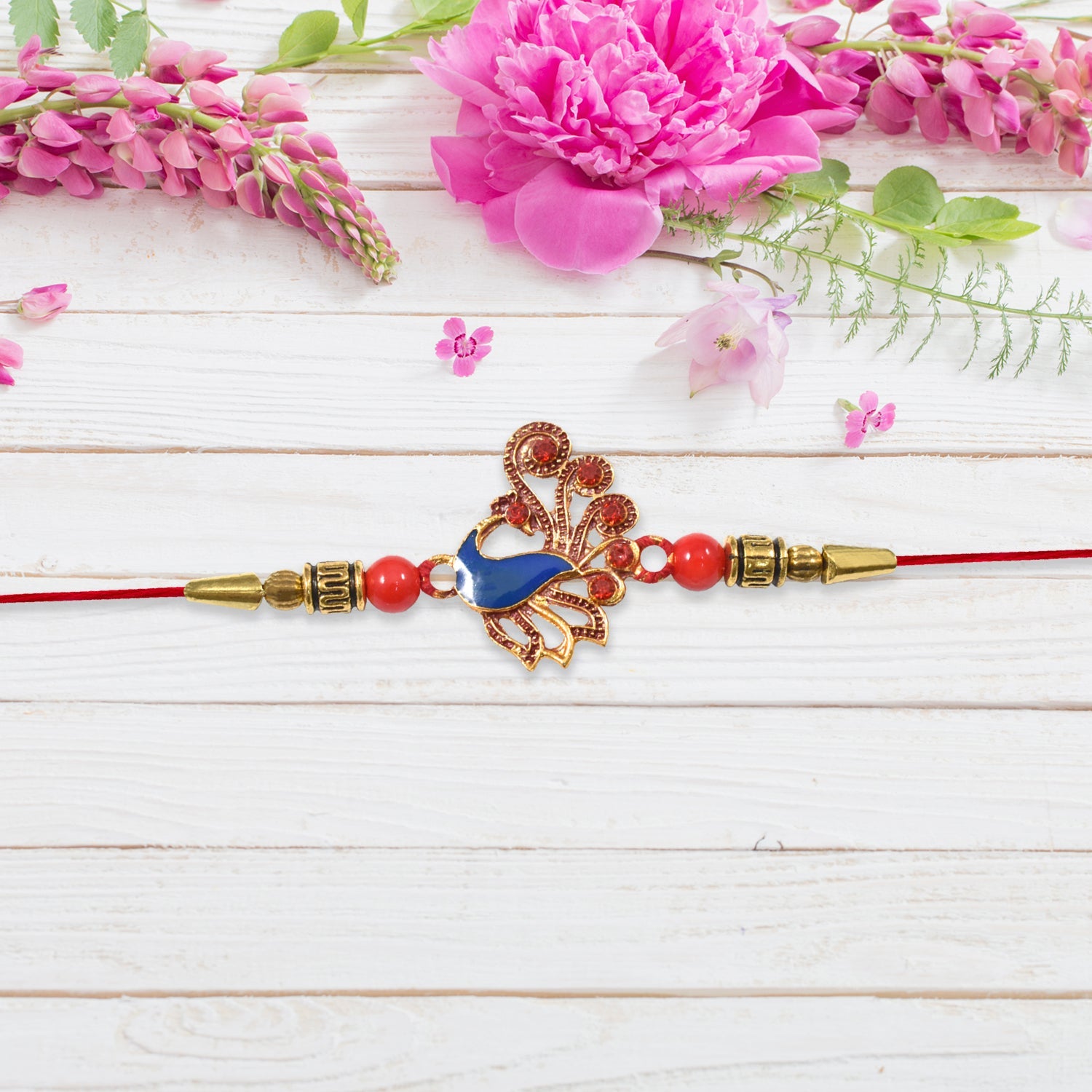 Ethnic Peacock Rakhi With Stone Detailing Wukusy