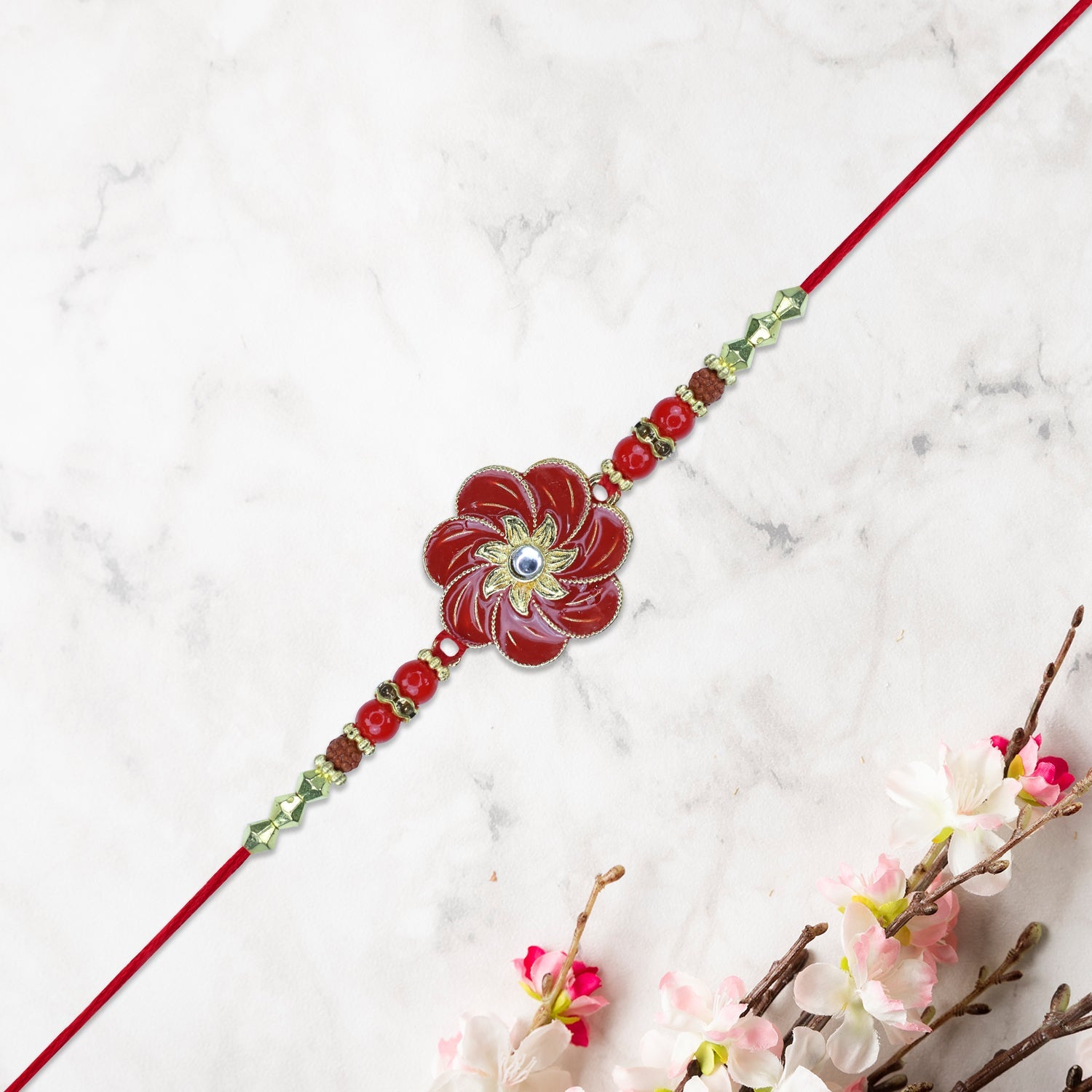 Red Floral Designer Rakhi Wukusy