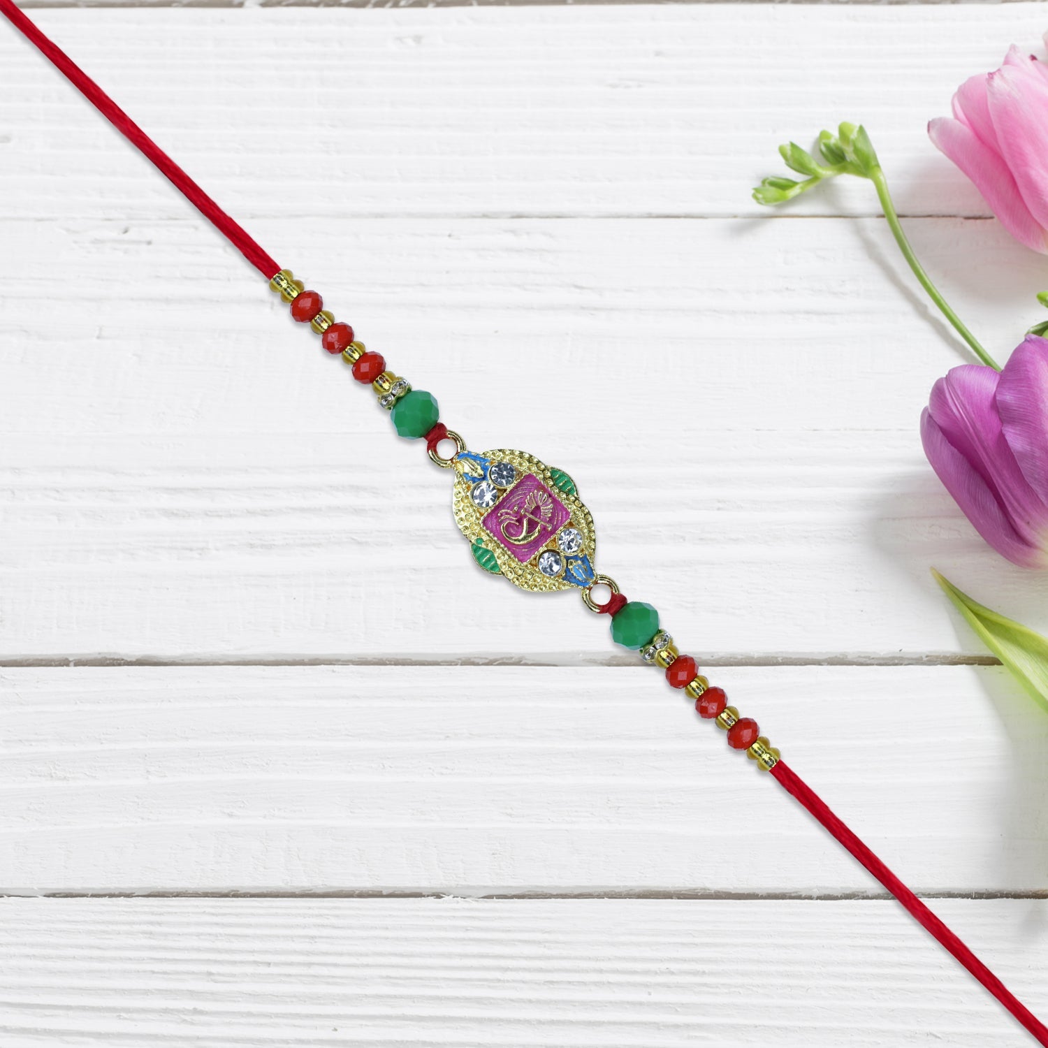 Om Rakhi With Decorative Beads And Stone Work Wukusy