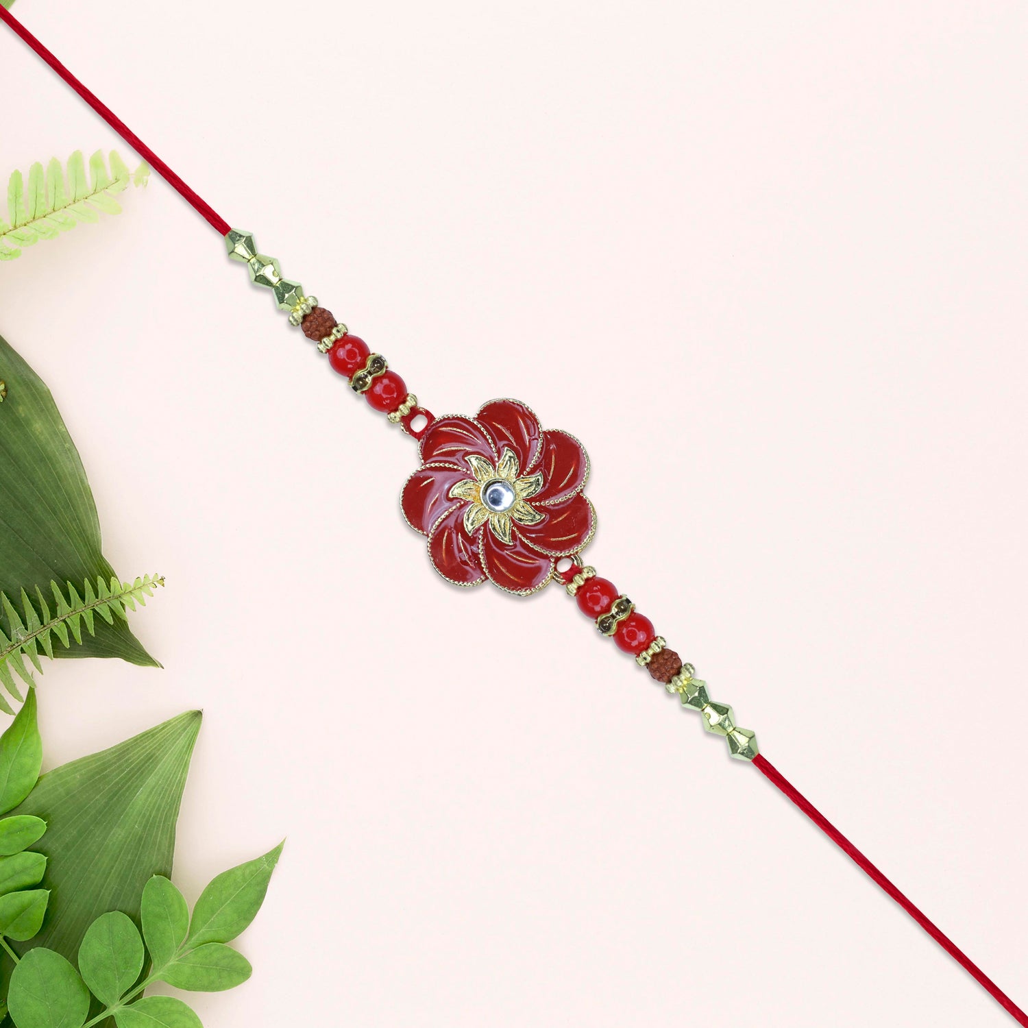 Red Floral Designer Rakhi Wukusy