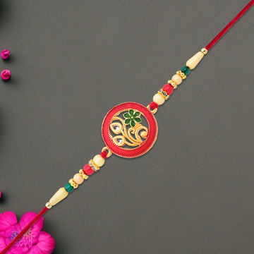 Round Designer Paisley Rakhi With Floral Charm Wukusy