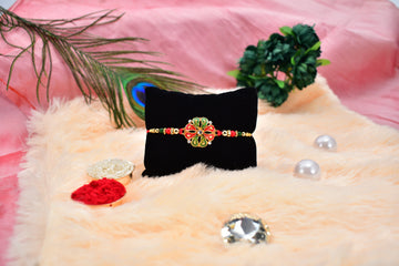 Designer Flower Rakhi With Colorful Enamel Petals And Golden Beads Wukusy