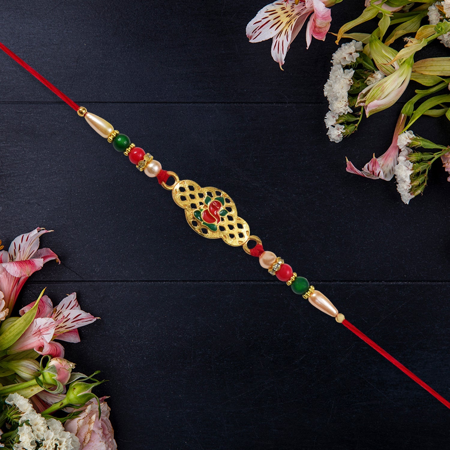 Religious Ganesha Rakhi In Gold Finish Wukusy