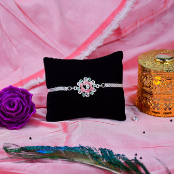 Elegant Floral Om Rakhi With Pink-green Accents Wukusy