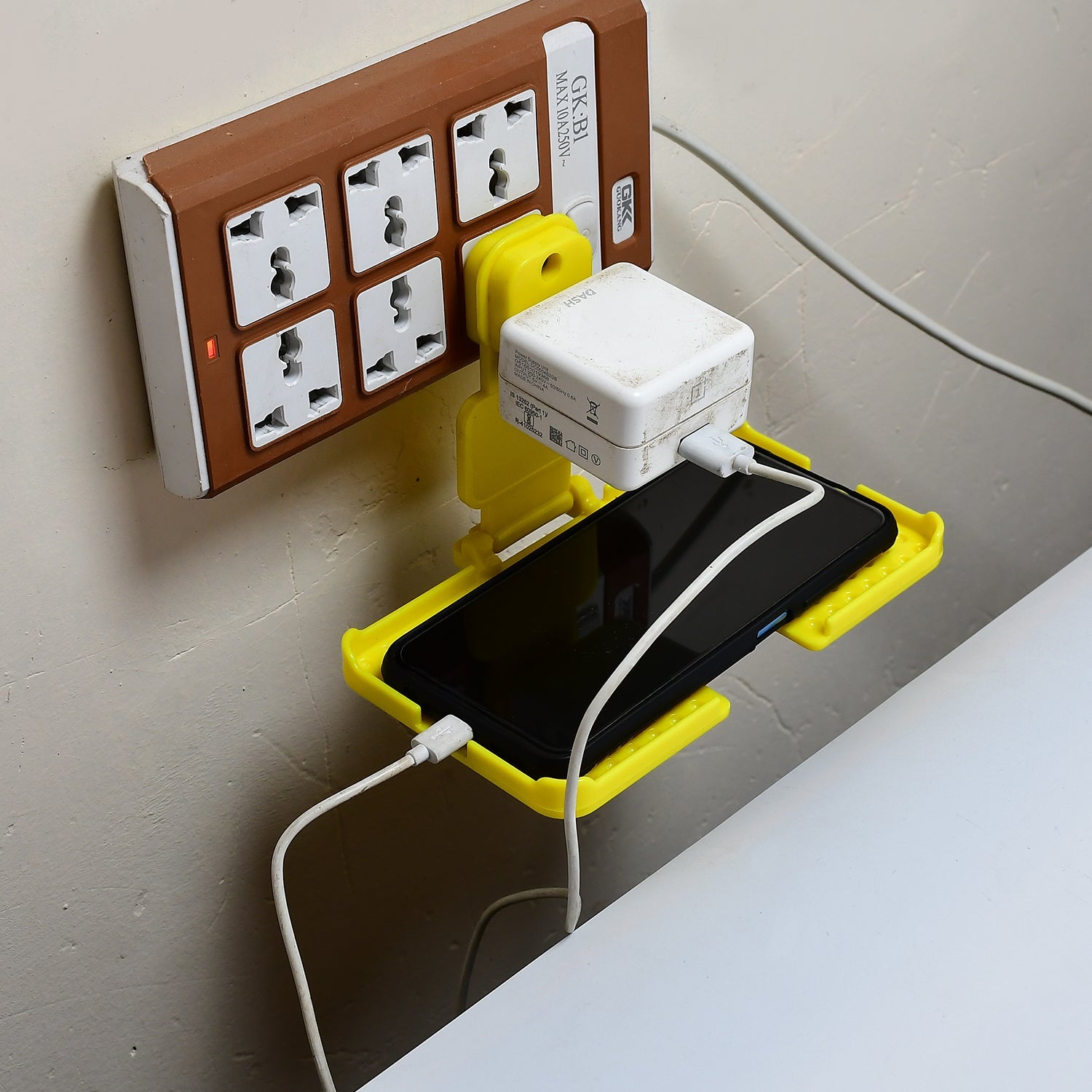 6498 Multi-purpose Wall Holder Stand For Charging Mobile Just Fit In Socket And Hang (Yellow) Wukusy