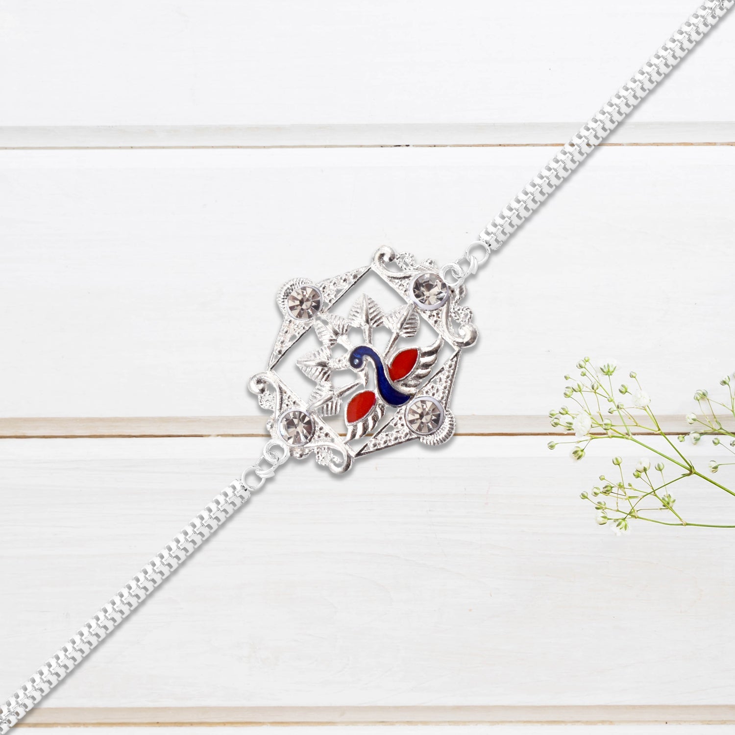 Silver Peacock Rakhi With Diamond Accents Wukusy