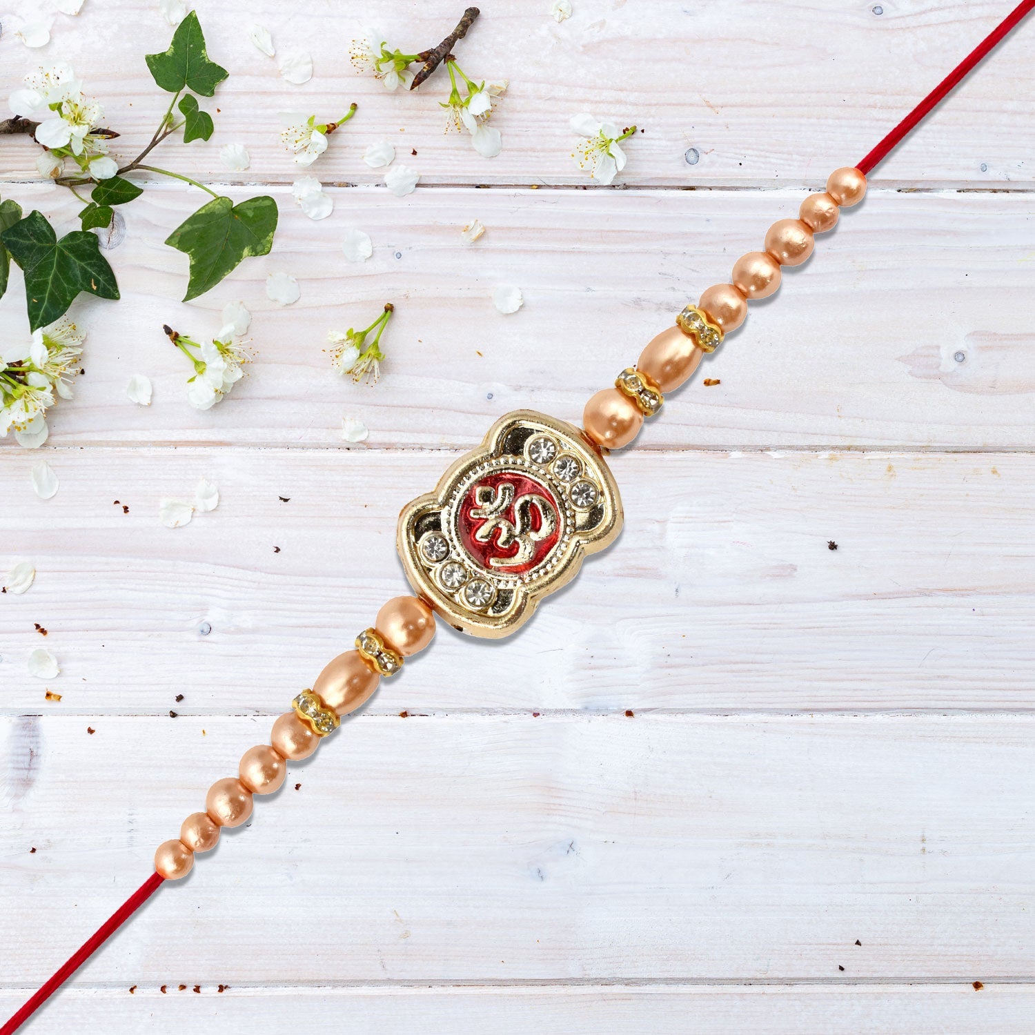 Om Rakhi With Stone Embellishments  Golden Beads Wukusy